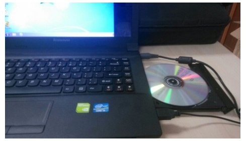 如何用光盘自动安装win7系统64位操作系统