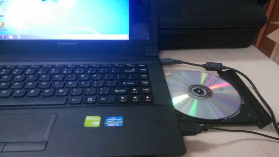 如何用光盘自动安装win7 64位操作系统